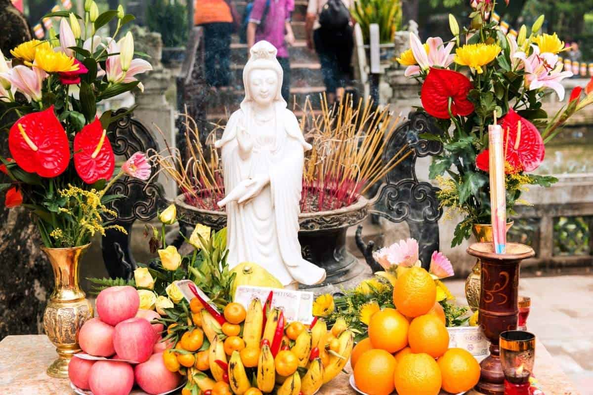 Vietnamese temple altar with sacrificial offering 