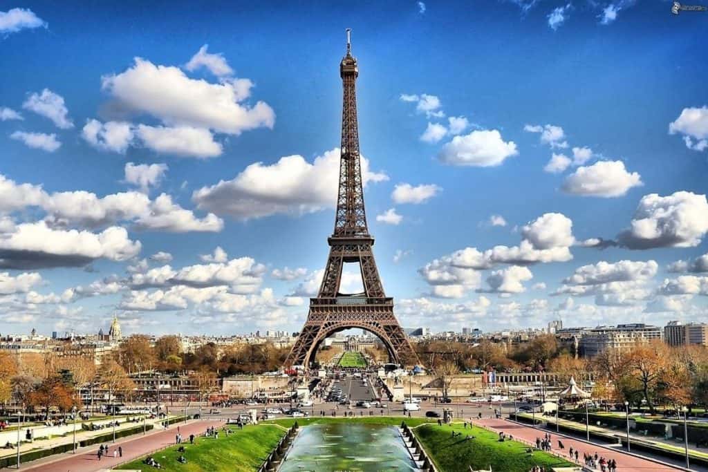 View of the Eiffel Tower in Paris, France with a blue sky