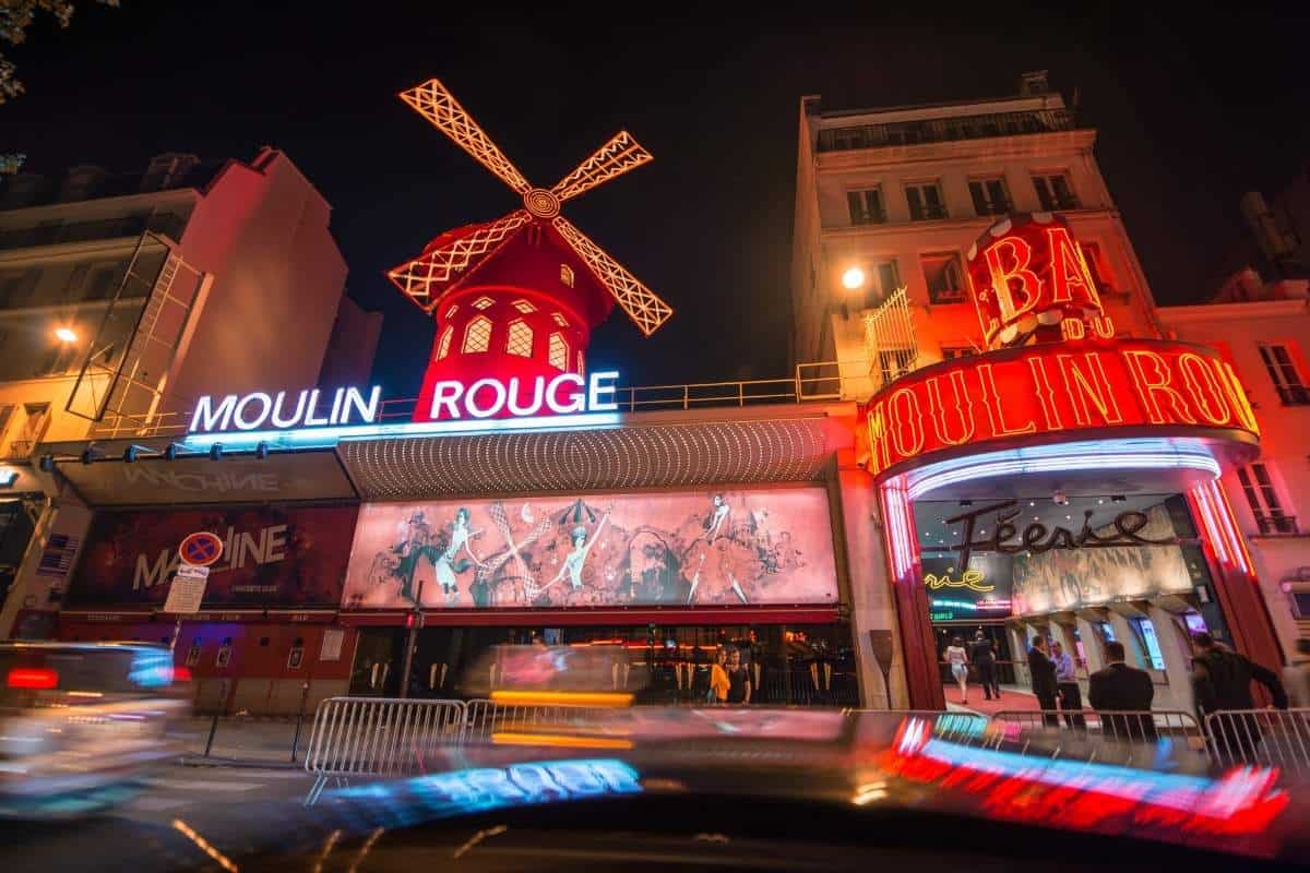 Moulin Rouge Cabaret in Paris, France lit up at night