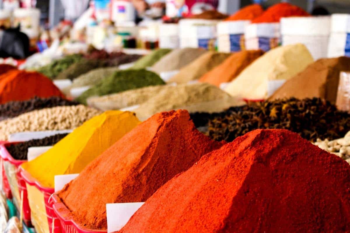 Facts about India - Colorful piles of spices on display at an Indian spice market