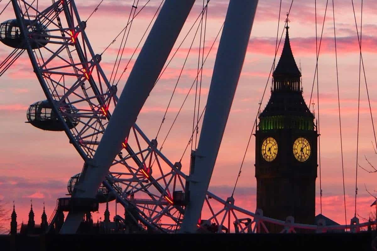 Elizabeth Tower seen through the London Eye ferris wheel in London, England at sunset