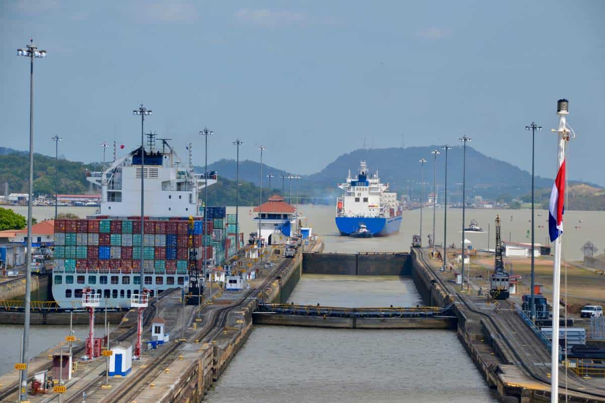 The double locks of the Panama Canal with container ships heading to the Pacific