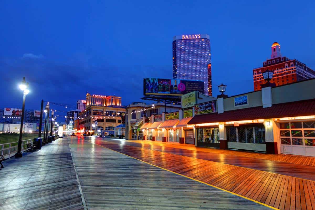 The Atlantic City casinos and Boardwalk along the oceanfront at night