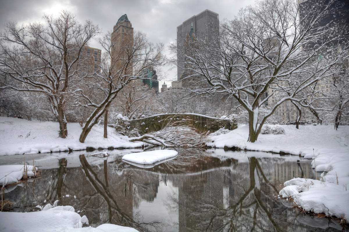 New York City Central Park bridge covered in snow in winter